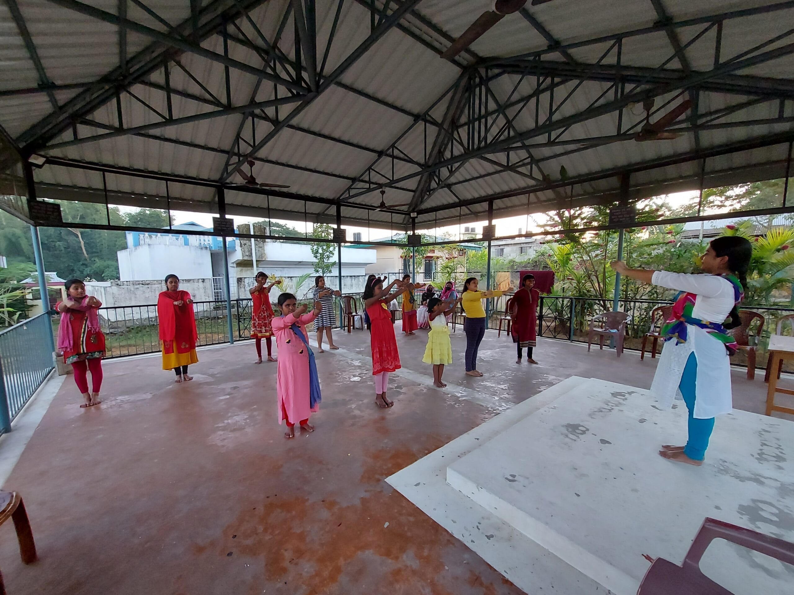 Guru Debatosh Nath conducting Kathak history session during cultural preservation workshop in Assam